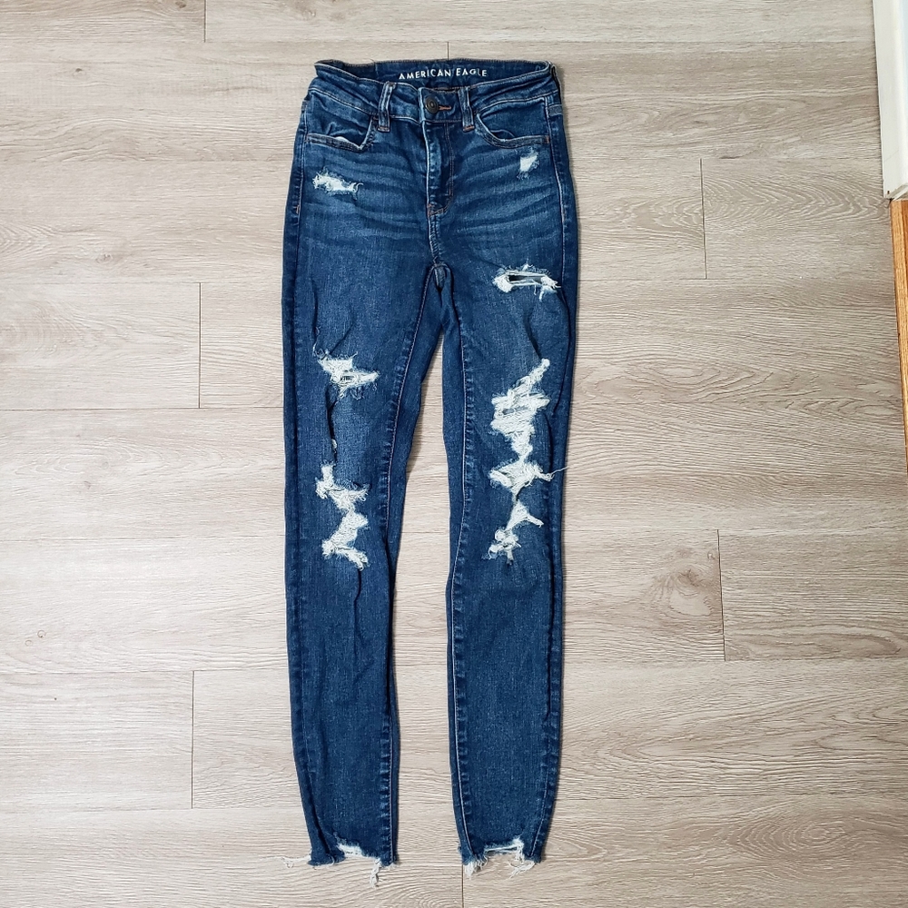 American Eagle high rise distressed raw hem denim jegging stretch size 2